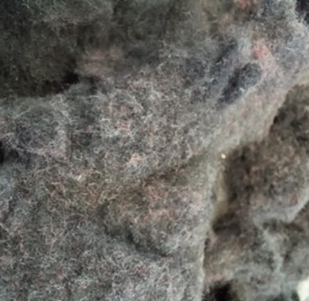 Recycling of textile waste for the production of recycled and recyclable paper